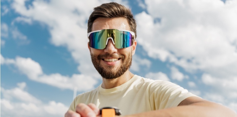 man wearing sports glasses